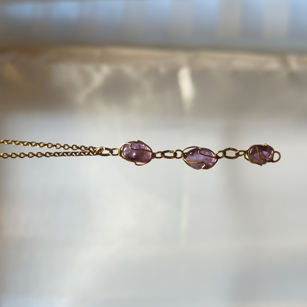 Adjustable gold necklace with wire-wrapped purple quartz pendant, 18"